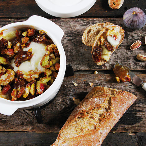 Oven-baked Camembert with figs, walnuts and pistachios