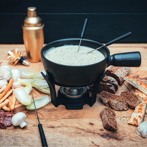 Goat cheese fondue with truffle tapenade